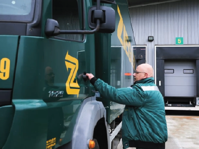 Ziegler driver opening a Ziegler branded truck door